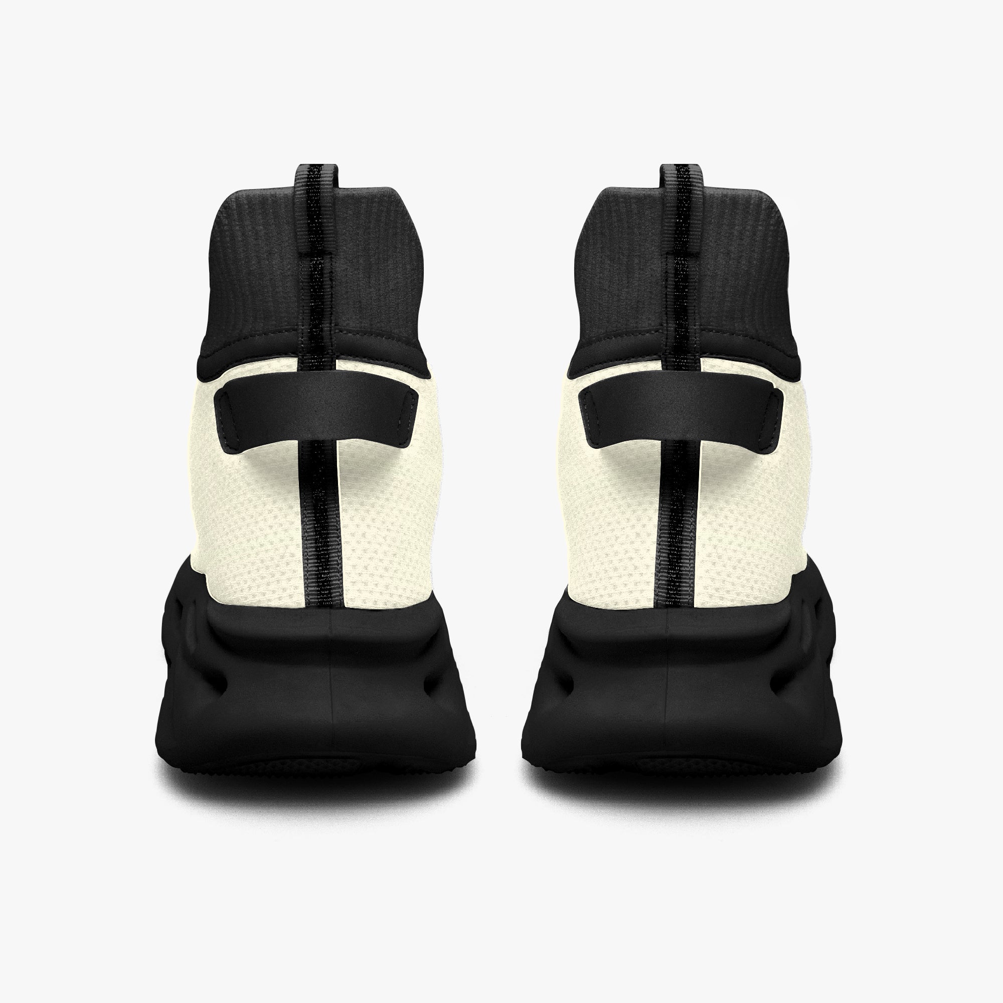 Black and white high-top mesh knit sneakers with cushioned black soles, rear view.