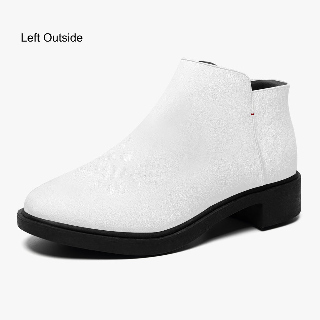 Modern white slip-on bootie with chunky black heel and subtle red accent stitch.