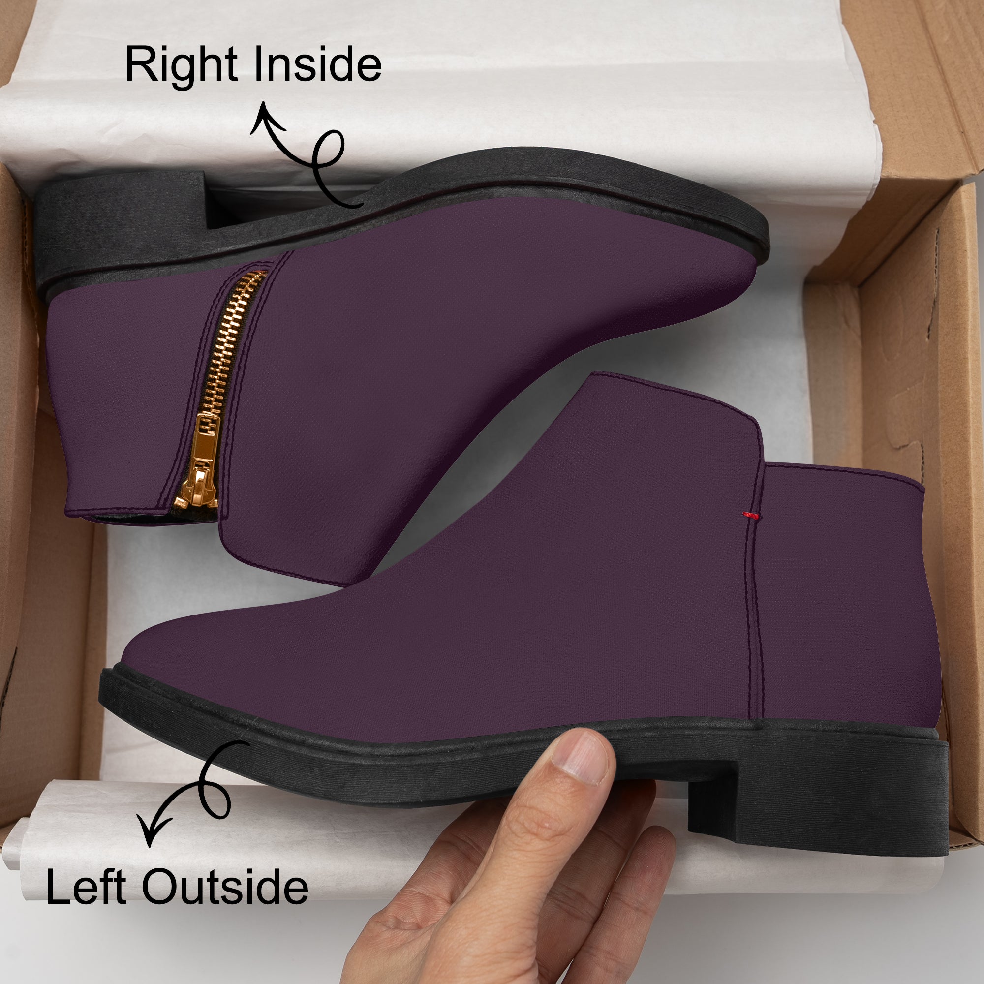 Deep plum slip-on ankle boots with chunky black heel and red accent stitch, gold zipper on side.