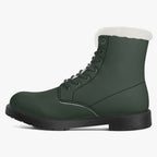 Forest green leather winter boot with black laces and plush white faux fur collar.