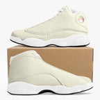 Cream and white high-top leather basketball sneakers with smooth upper and distinctive sole design.