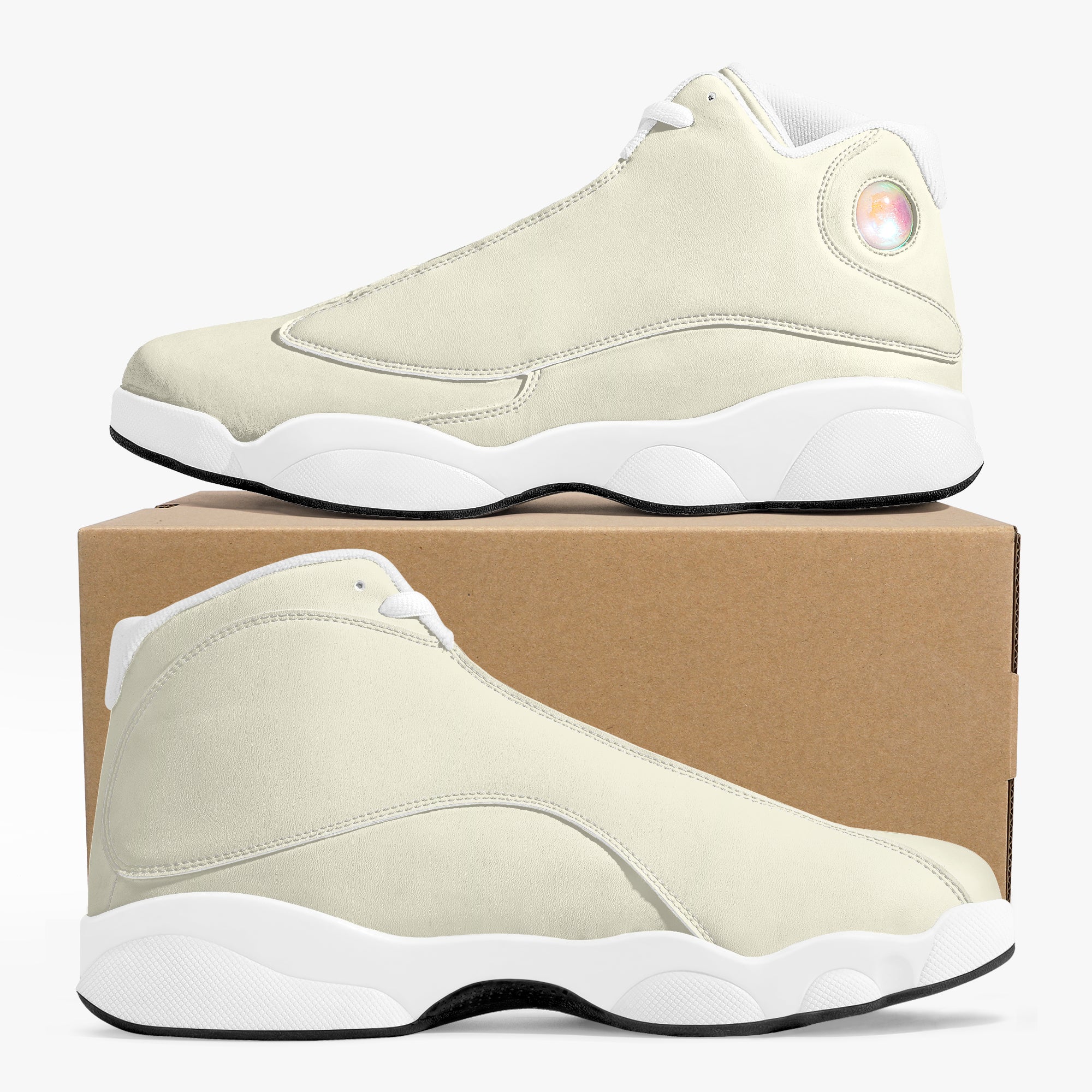 Cream and white high-top leather basketball sneakers with smooth upper and distinctive sole design.