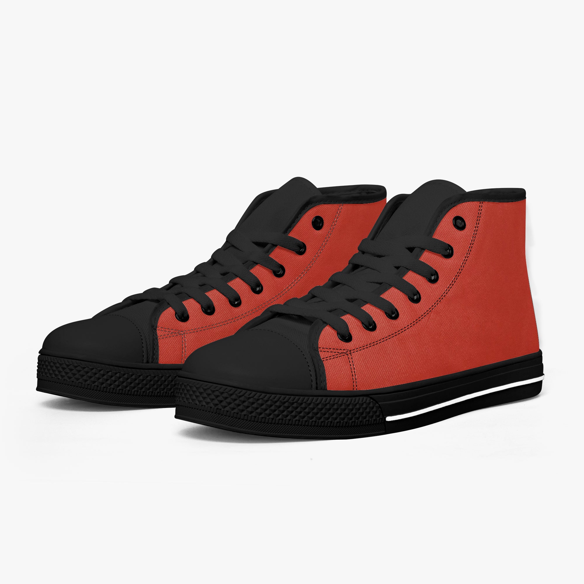 Bold red high-top canvas sneakers with black toe caps, laces, and soles, white stripe on sole.