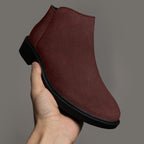 Burgundy corduroy ankle boot with chunky black heel and smooth rounded toe.