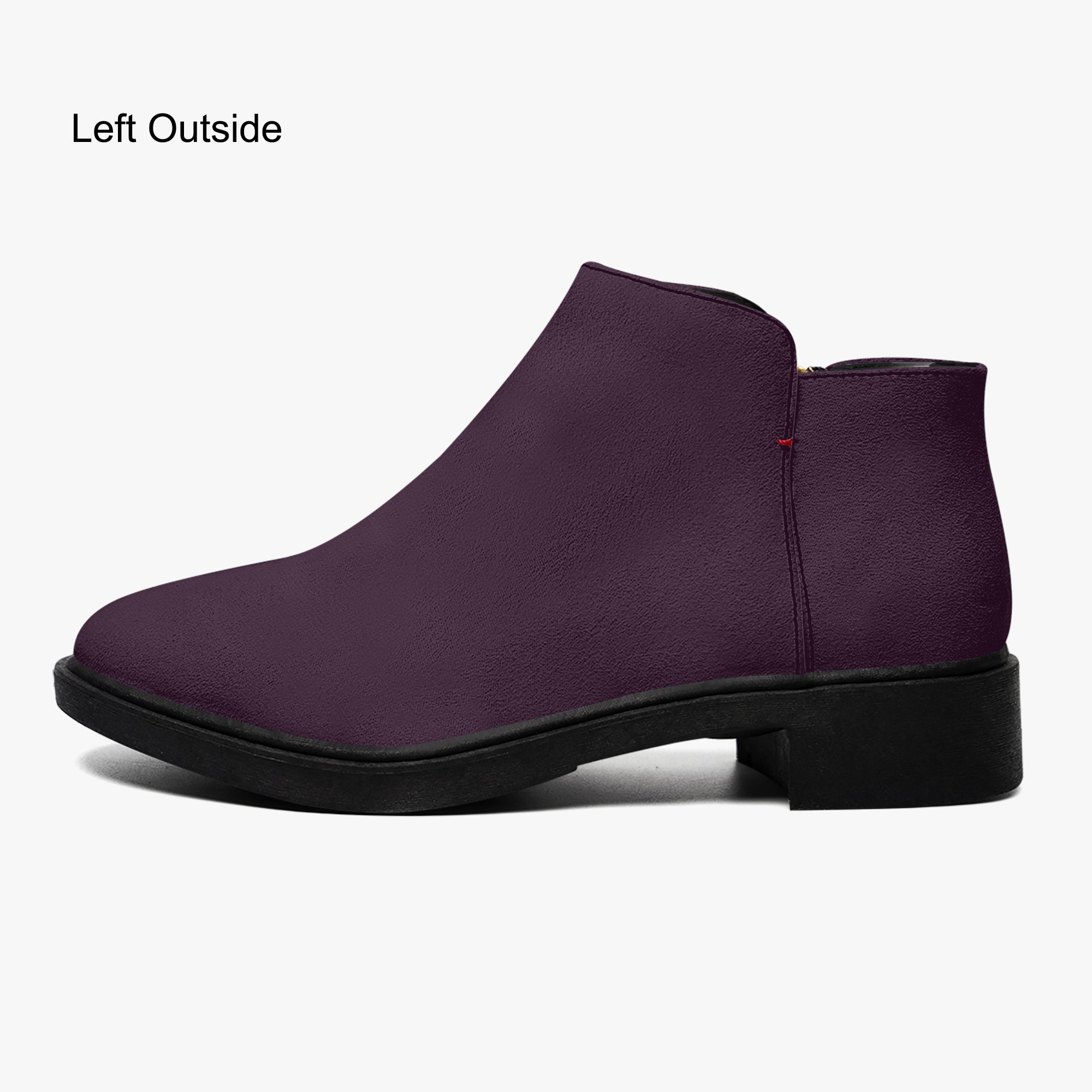 Deep plum slip-on bootie with chunky black heel and subtle red accent stitch.