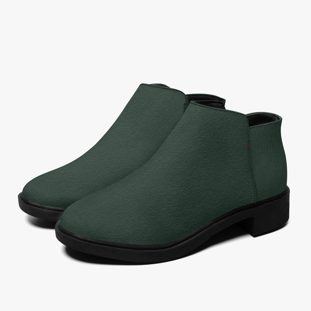 Dark green textured ankle boots with smooth black chunky heels and sleek rounded toes.