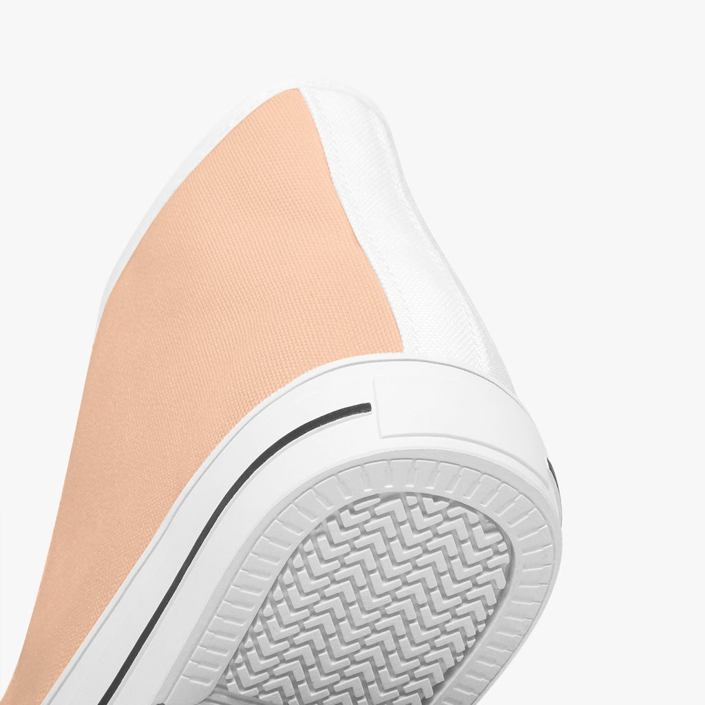 Peach and white high-top canvas sneaker with textured rubber sole and black trim details.