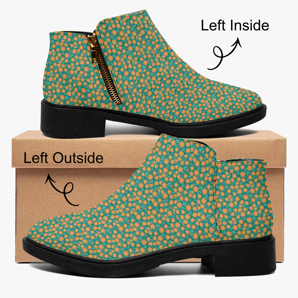 Teal ankle boots with orange floral print, chunky black heel, and side zipper, shown inside and outside views.