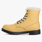 Sunny mustard leather lace-up winter boot with black sole and plush white faux fur collar.