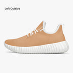 Beige mesh knit low-top sneaker with white ribbed sole and white laces.