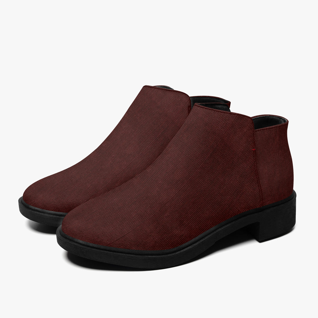 Burgundy corduroy ankle boots with chunky black heel and side zipper closure.