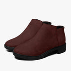 Burgundy corduroy ankle boots with chunky black heel and side zipper closure.